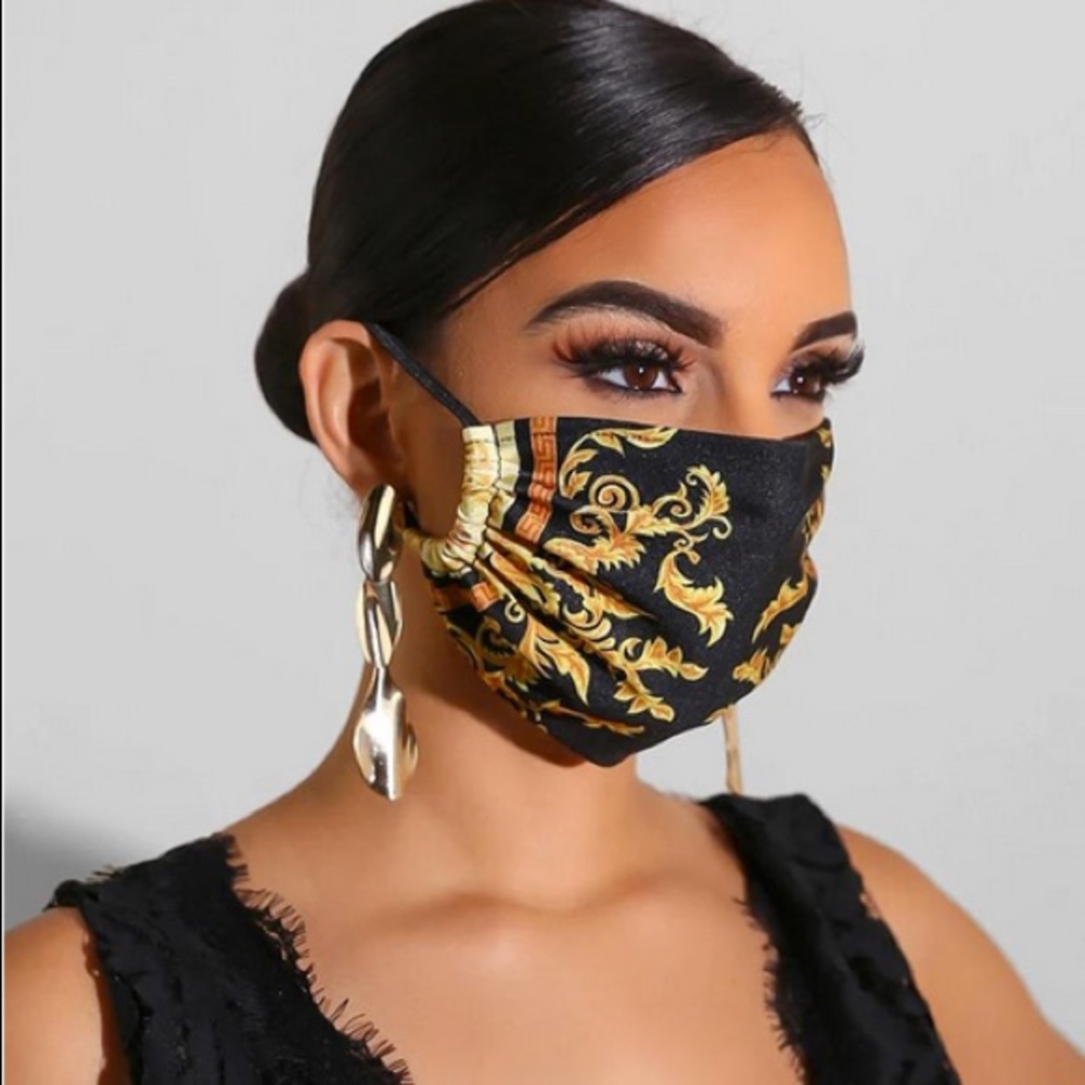 Black and gold face mask